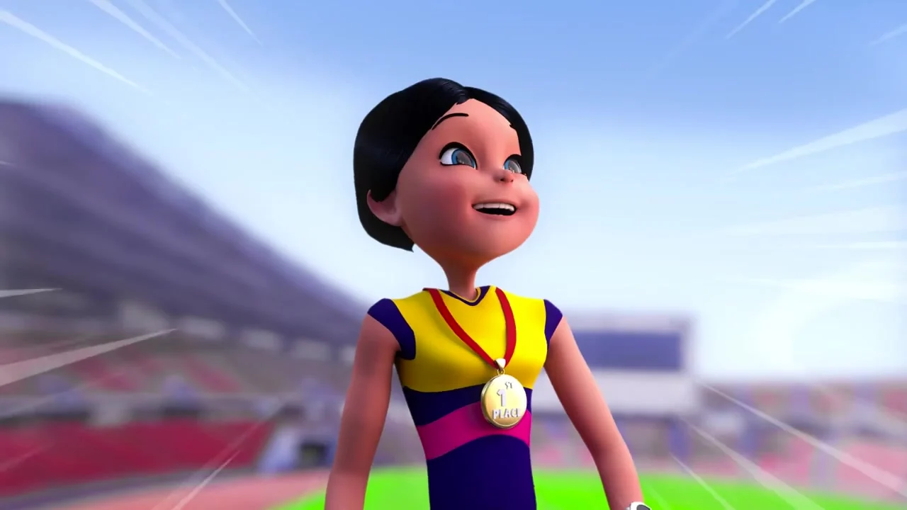 The athlete looking up with a medal round her neck